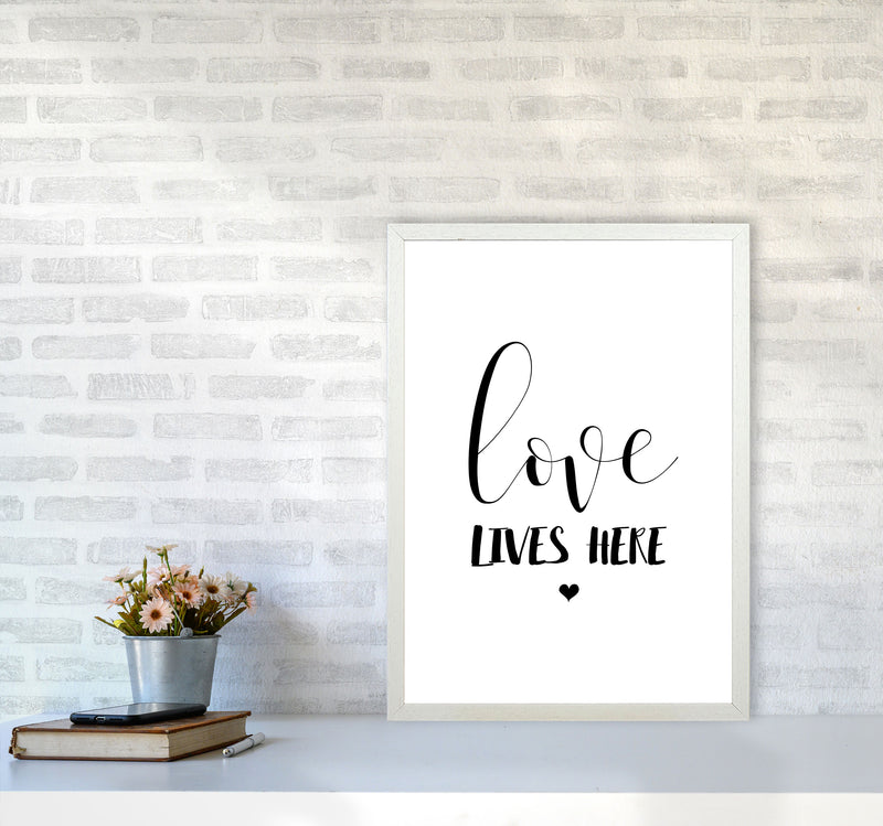 Love Lives Here Framed Typography Wall Art Print A2 Oak Frame